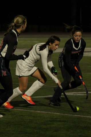 Sofia Ghanbari, junior, strides down the field, passing the Liggitt defenders on her left and right. The girls defeated Liggitt 3-2 on Monday Oct. 17. The team will continue on to district semi-finals, playing on Monday Oct. 24.
