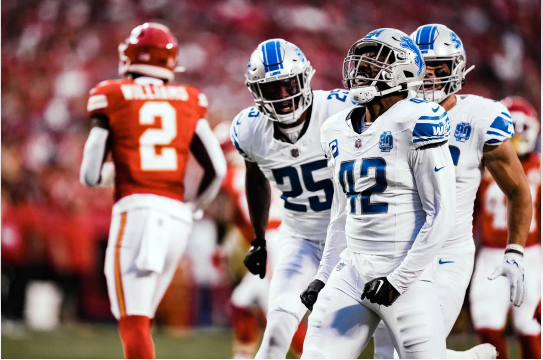 Lions players celebrate a touch-down against the Kansas CIty Chiefs.