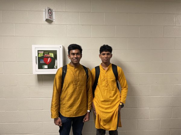 Two students celebrate Diwali by wearing traditional clothing to school on Nov. 10.
